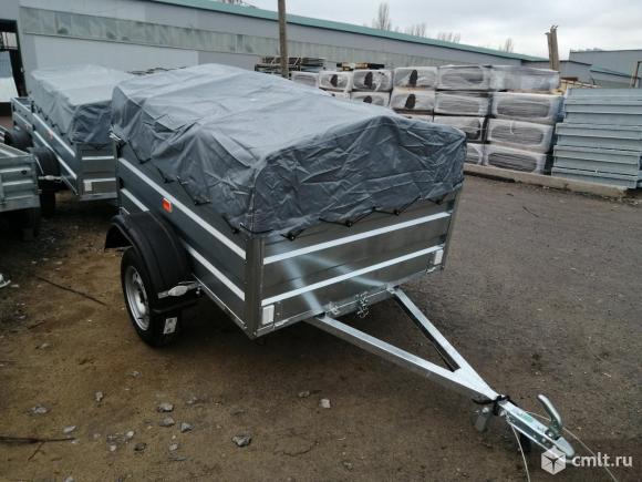 Прицеп Титан 1713-05 с колесами и тентом. Фото 1.