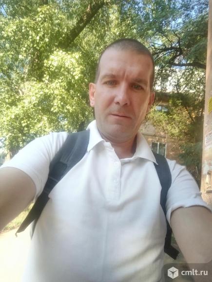 Грузчик-кладовщик. Фото 1.