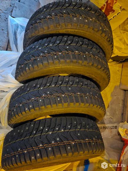 Шины Kumho WS31 225  65 R17 106T шип. Фото 5.