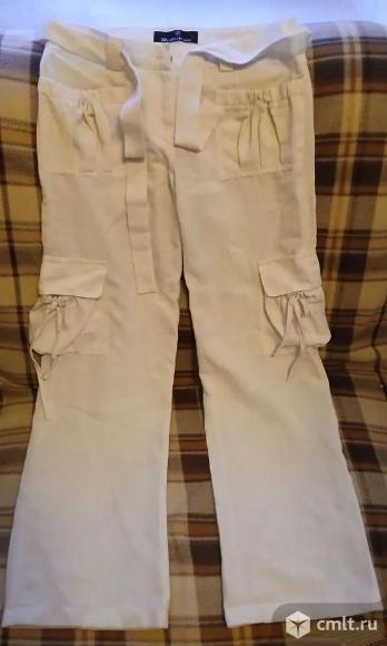 Брюки женские белого цвета 44. Фото 1.