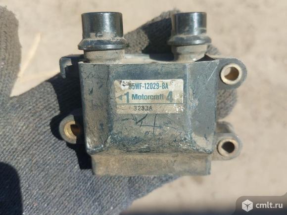 катушка зажигания для Ford Scorpio 1 б/у номер 95WF12029BA, 7053859Катушка зажигания FORD Galaxy/Scorpio 2.0LДля моделейFord Escort, EA, FAFord Galaxy, VXFord Granada, CE, DEFord