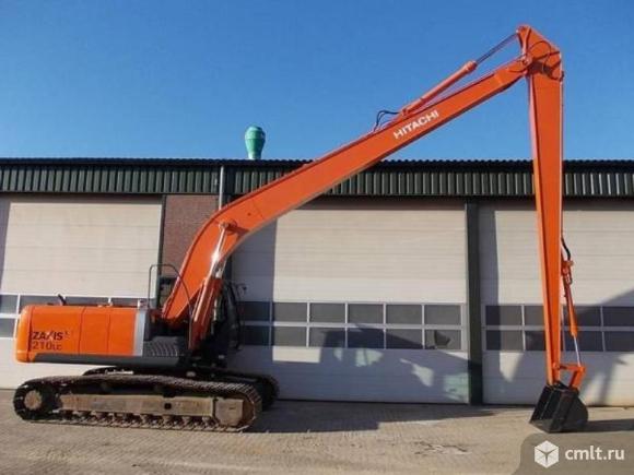 Aренда экскаватора гусеничного с длинной стрелой(рукоятью) до 18 метров.. Фото 1.