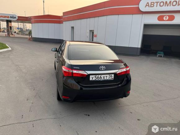Toyota Corolla - 2014 г. в.. Фото 1.