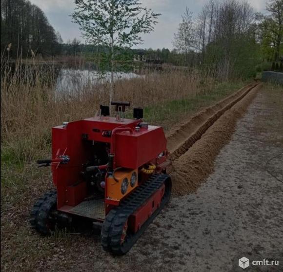 Услуги мини траншеекопателя с оператором. Фото 1.