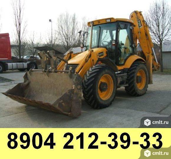 Машинист на импортный экскаватор-погрузчик. Фото 1.