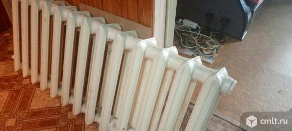 Радиатор отопления чугунный. Фото 1.