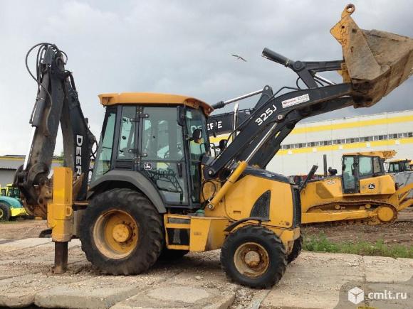 Оператор экскаватора погрузчика. Фото 1.