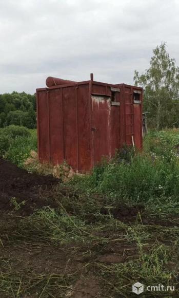Сарай-бытовка контейнерного типа. Фото 1.