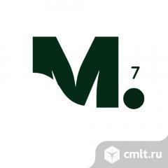 Продавец одежды. Фото 1.