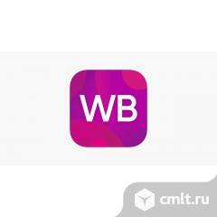 Сотрудник пункта выдачи заказов Вайлдберриз. Фото 1.