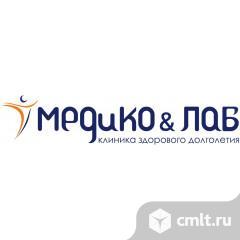 Врач отоларинголог. Фото 1.