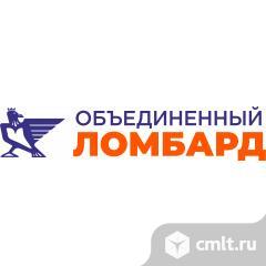 Продавец ювелирного магазина при ломбарде. Фото 1.