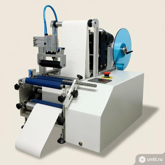 Этикетировочный автомат для цилиндрической тары ЭН00.06. Фото 1.