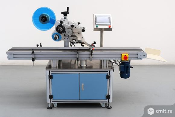 Этикетировочный автомат для плоских поверхностей ЭМ04.02 100 шт/мин. Фото 1.