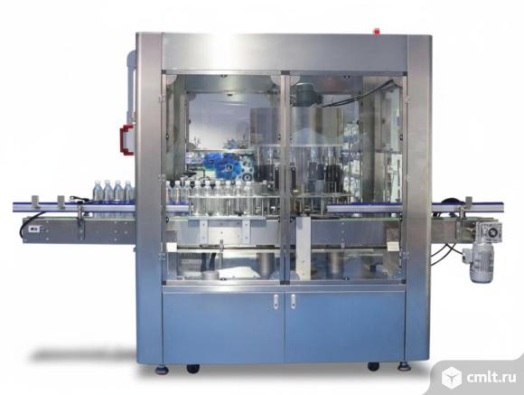 Автоматический этикетировщик роторного типа 30000 шт/час. Фото 1.