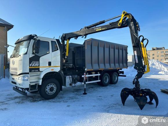 Вывоз мусора ломовоз. Фото 1.