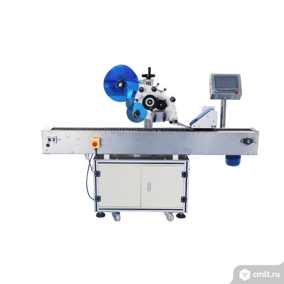 Автоматический этикетировщик ЭМ05.06 с вертикальной подачей 150 шт/мин. Фото 1.