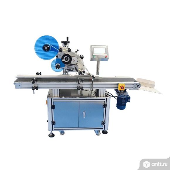 Этикетировочный автомат для плоских поверхностей ЭМ04.02 100 шт/мин. Фото 1.