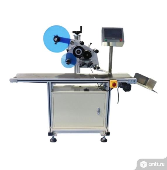 Этикетировочный автомат ЭМ04.03 с узлом приглаживания. Фото 2.