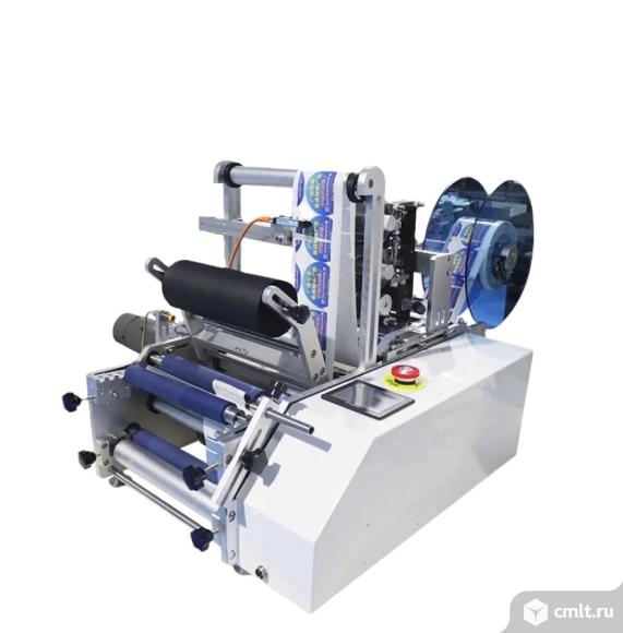 Этикетировочный автомат для цилиндрических бутылок ЭН00.04. Фото 1.