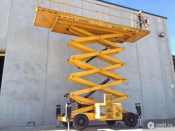 Спецтехника для высотных работ: ножничные и коленчатые. Фото 1.