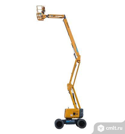 Ножничные подъёмники 12-18 м (500 кг, пл. 2.20х3.5) в аренду. Фото 1.