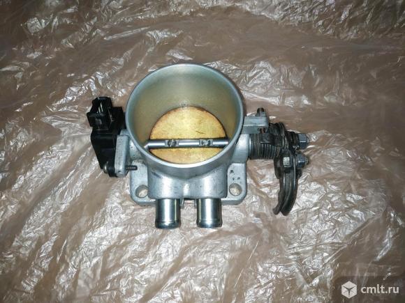 Дроссельная заслонка ЗМЗ 406 405. Фото 1.