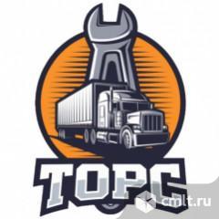 Автослесарь в грузовой автосервис. Фото 1.