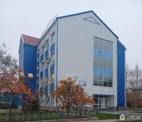 Здание общей площадью 1024,2 в пгт.Игрим. Фото 1.