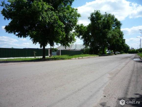 Продаётся Асфальтированая площадка 52 сотоки(5500 м2) по красной линии в пригороде Воронежа. Фото 1.