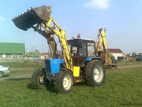 Экскаватор-погрузчик Амкодор-ТО49 на базе МТЗ-82 2000 г. в. Фото 1.