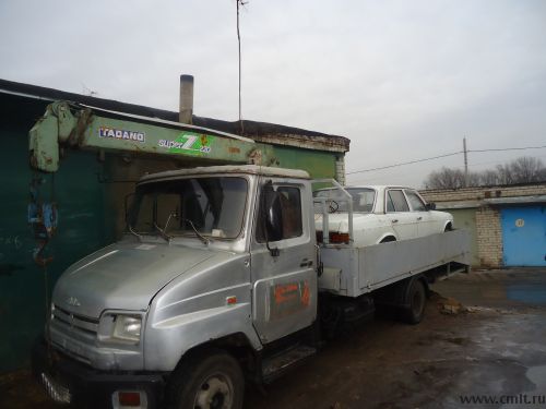 Продаю Эвакуатор-манипулятор бортовой. Фото 2.