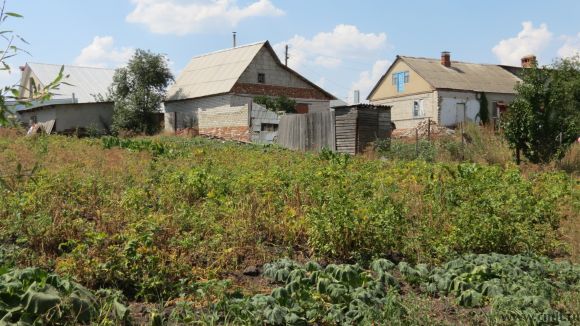 Дом у реки. Фото 1.