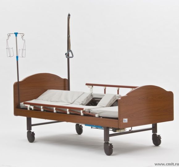 Кровать для тяжелобольных с функцией переворачивания с боку на бок.