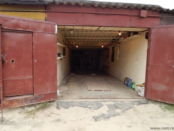 Продаетя металлический гараж. Внутри кирпичный. Фото 1.